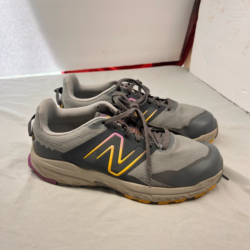 New Balance Women's Gray Sneakers with Yellow and Purple Accents